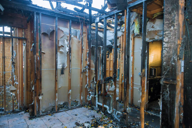 Professional Fire Damage Removal technician working in Utica, NY